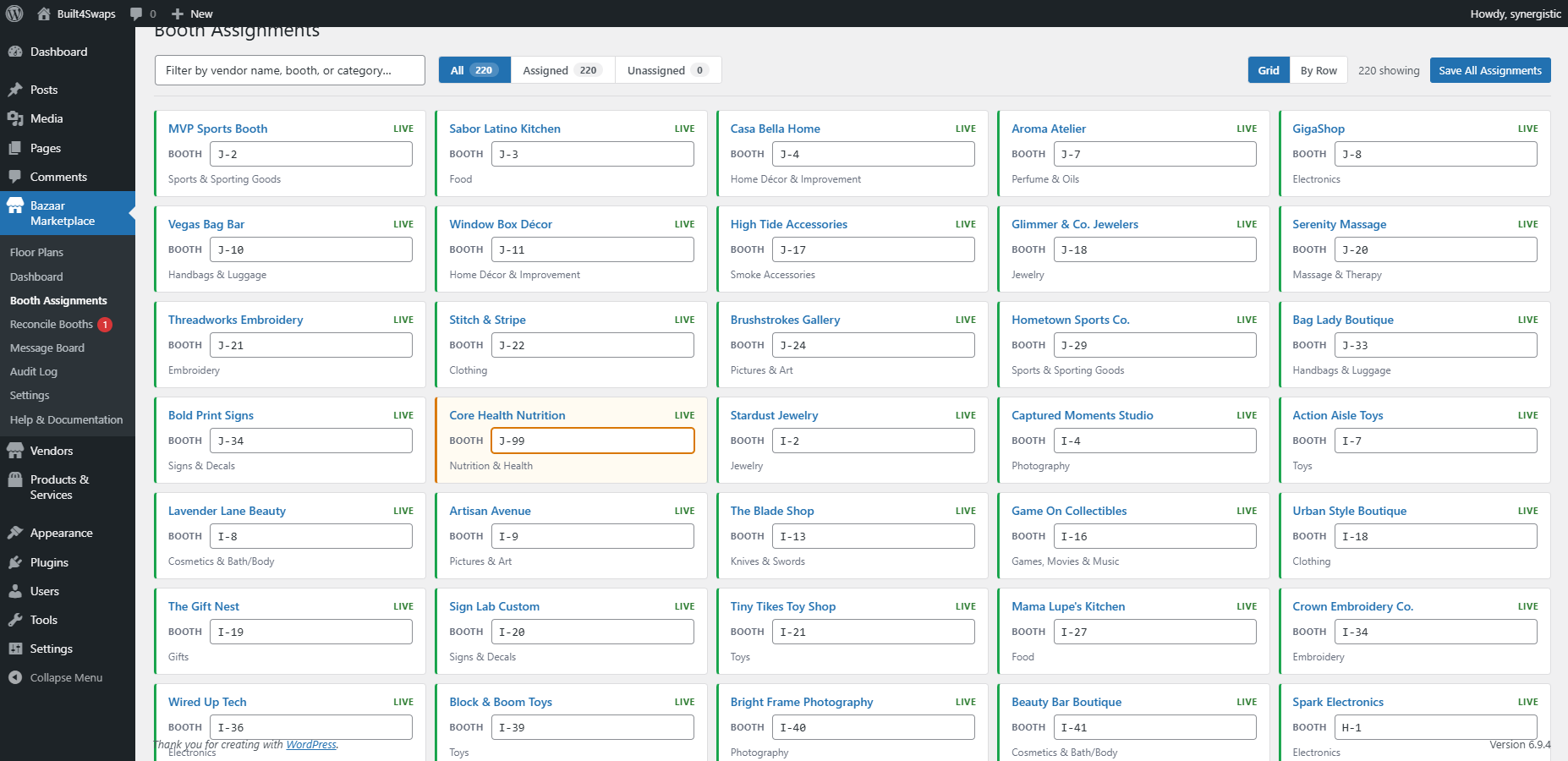 Operator admin Booth Assignments page — filter bar with All, Assigned, Unassigned tabs and a Save All Assignments button, then a five-column grid of vendor cards each showing the vendor name, LIVE badge, editable booth number input, and category.